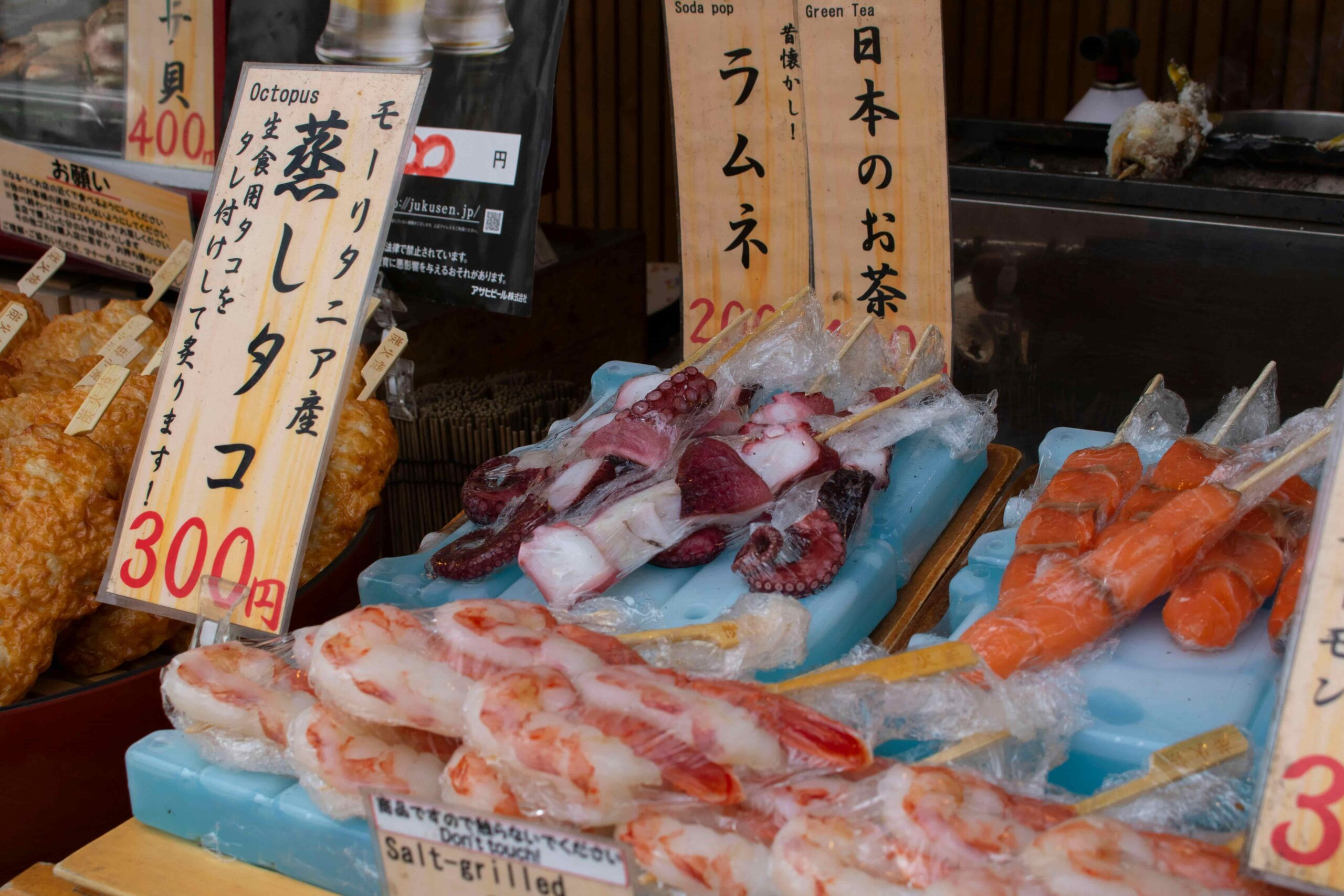 An image of a fish stall serving one the freshest fishes in Hokkaido Japan.