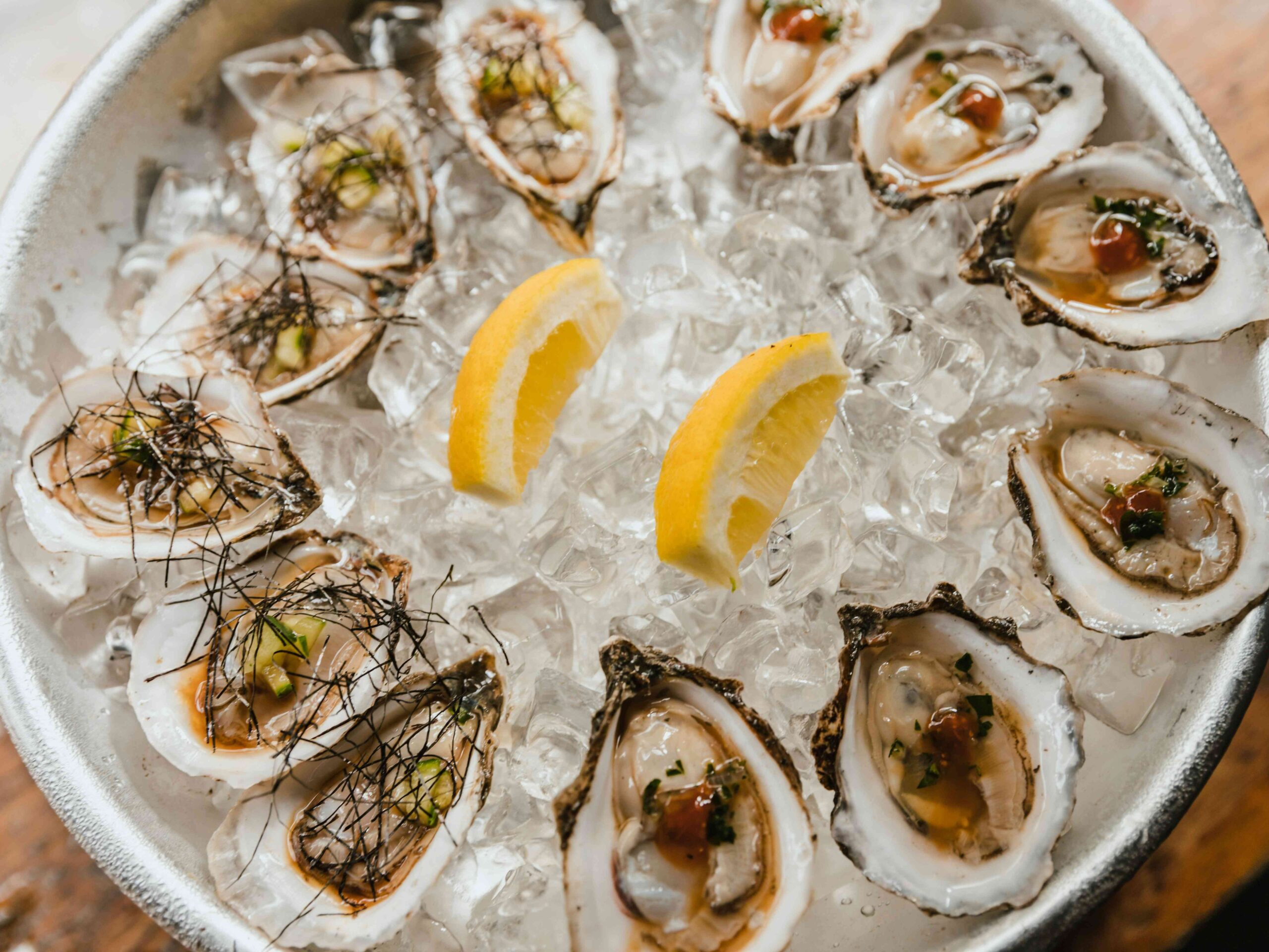 Hokkaido's Best Seaffod - 6 Oysters on ice with lemons, can be found during oyster festival.