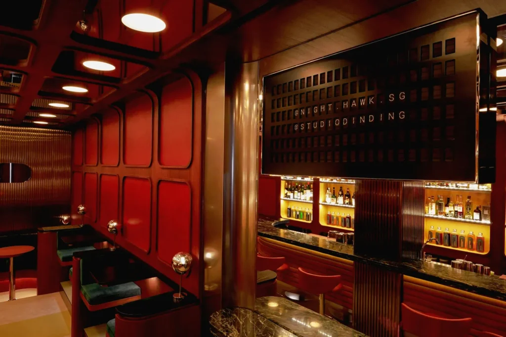 Modern cocktail bar interior with ambient lighting in Night Hawk