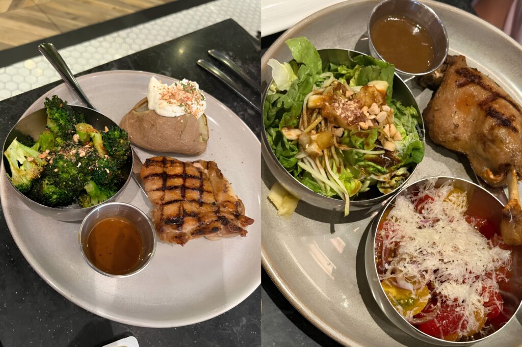 Grilled chicken meal with baked potato, broccoli, fresh salad, and sauce served at a restaurant inside 313 Somerset Singapore