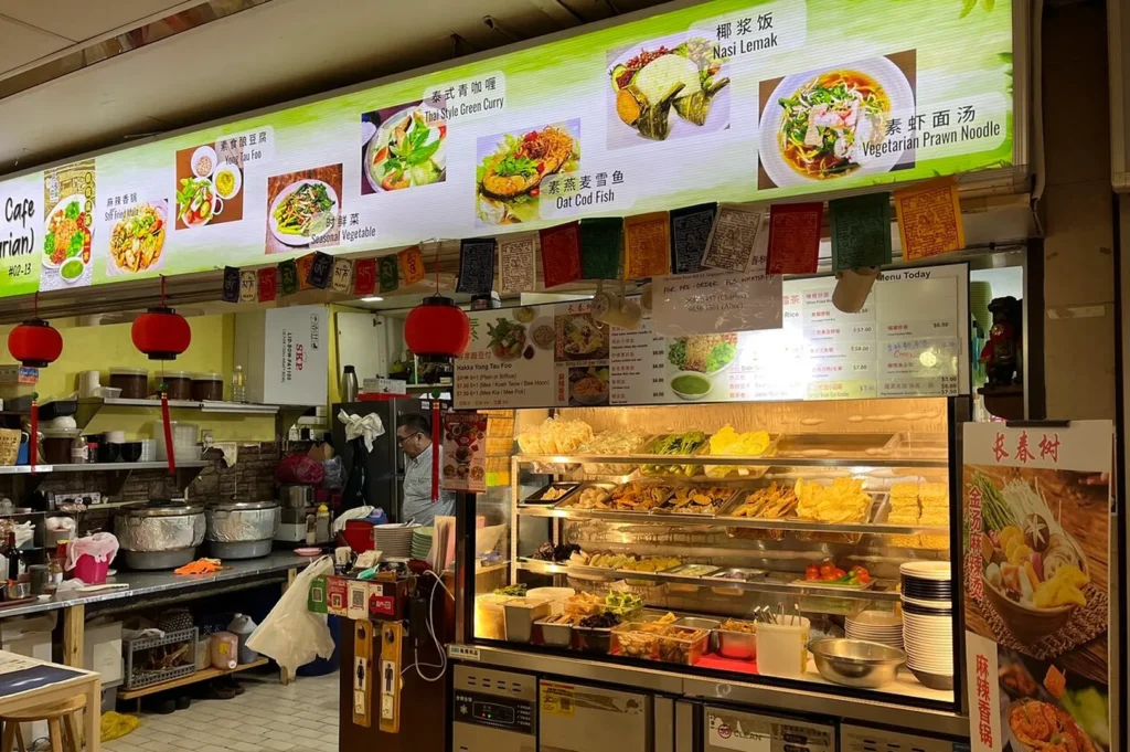 Pine Tree Cafe serving plant-based Chinese dishes, noodles, nasi lemak, and healthy meat-free meals.