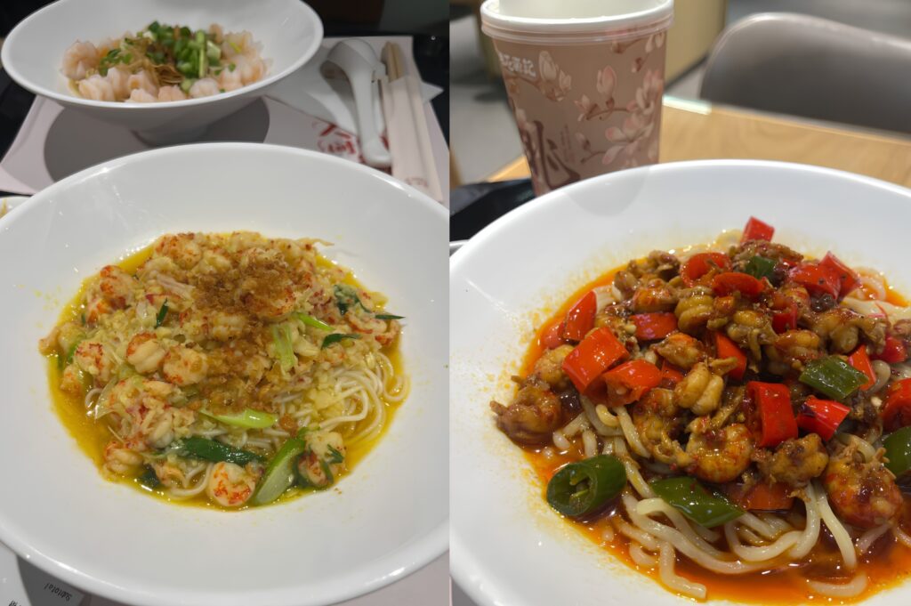 Seafood noodles and spicy stir-fried noodles served at a casual dining restaurant in 313 Somerset Singapore