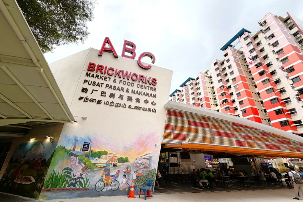 Exterior view of ABC Brickworks Market and Food Centre in Singapore with surrounding HDB flats