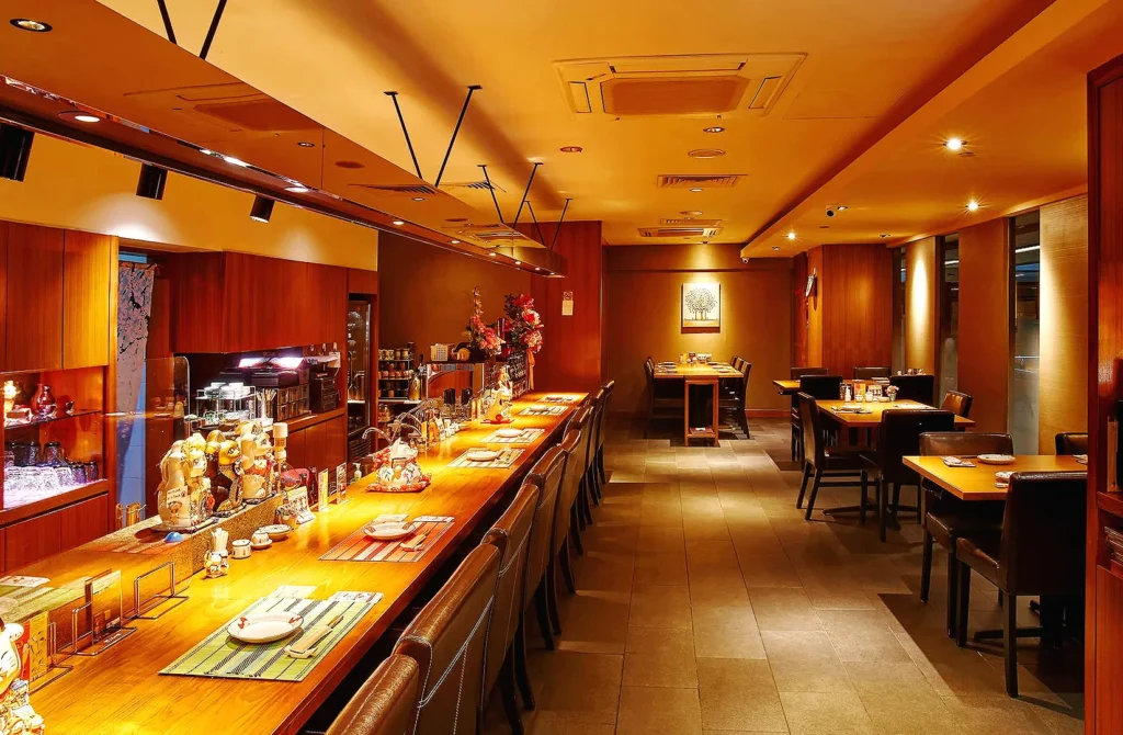 Hanashizuku Japanese Cuisine Singapore elegant Japanese restaurant interior with warm lighting and authentic dining atmosphere