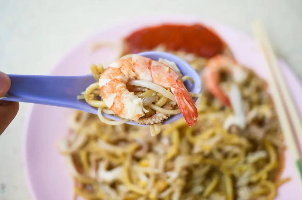 Hong Heng fried prawn mee with fresh shrimp, squid and seafood noodles at Tiong Bahru hawker centre Singapore