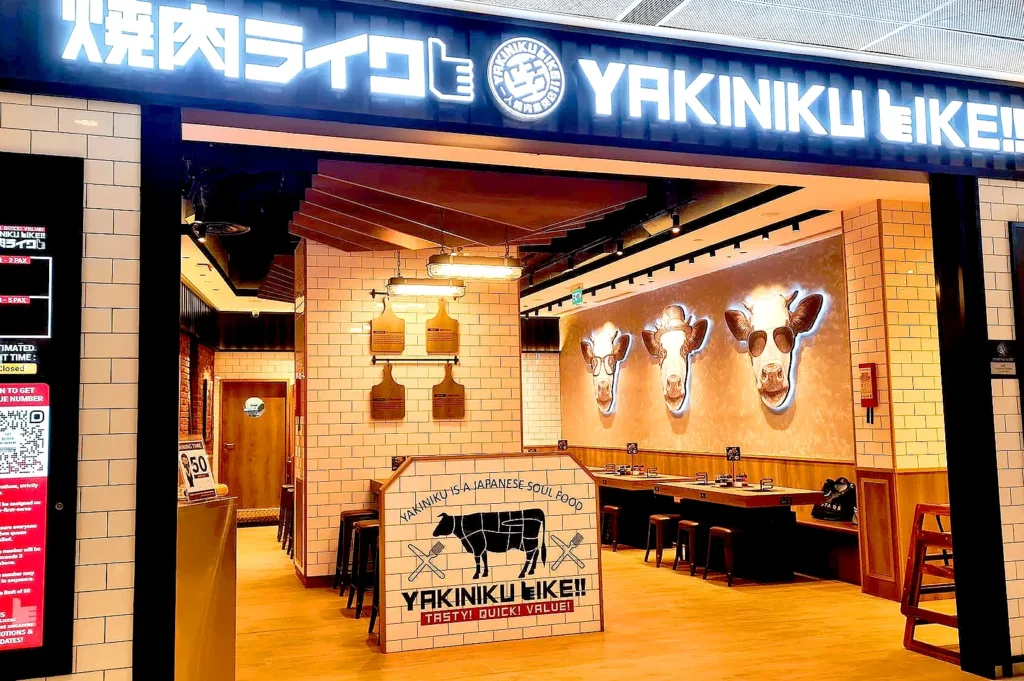 Yakiniku Like Singapore restaurant entrance with modern Japanese yakiniku dining and solo grill seating