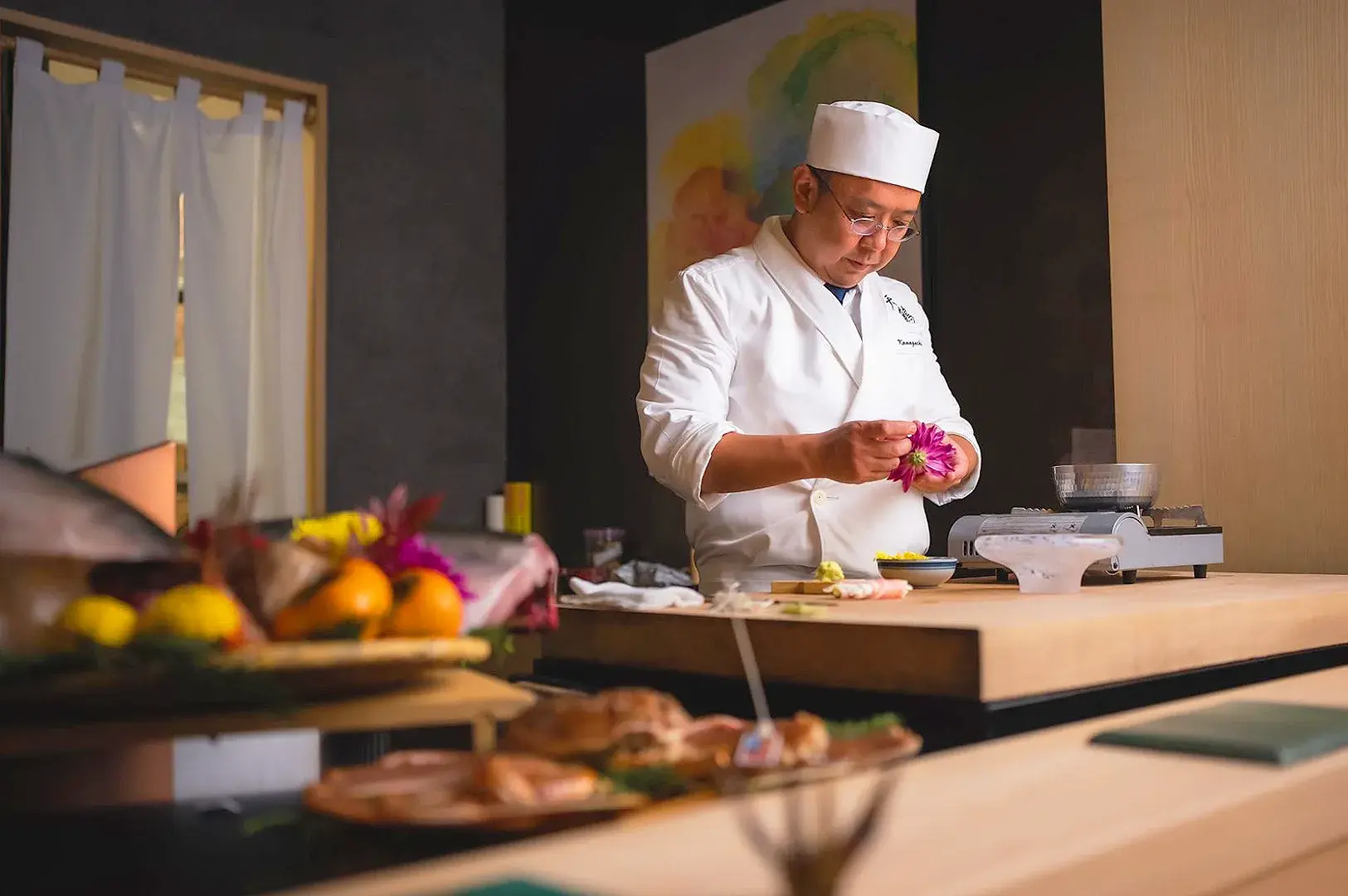 Japanese chef preparing vegetarian Japanese cuisine with meticulous plating and authentic omakase-inspired culinary presentation