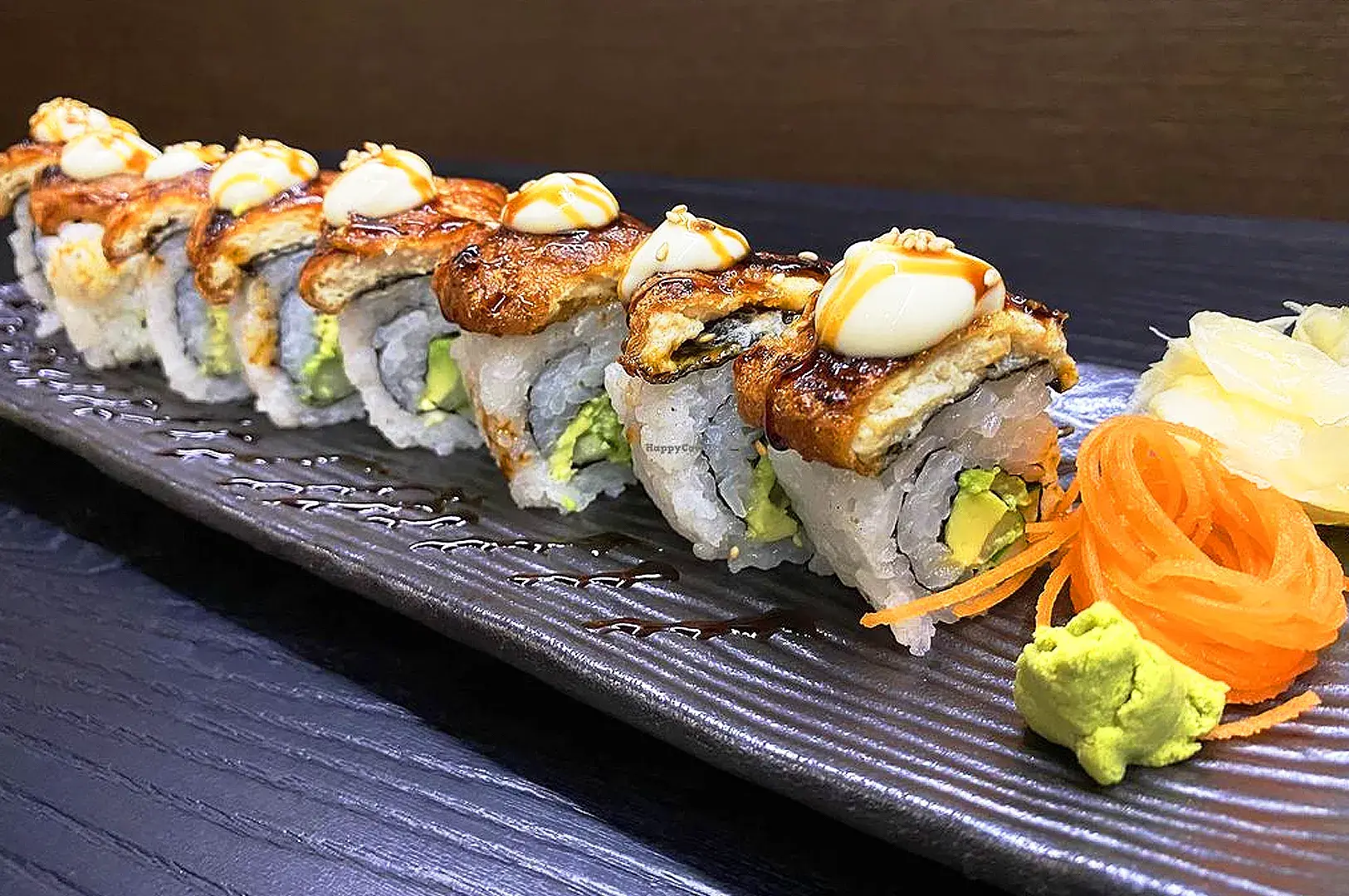 Herbivore Japanese Vegetarian Restaurant Singapore vegetarian unagi maki sushi with mock eel, avocado, glazed vegan sushi rolls and Japanese vegetarian cuisine