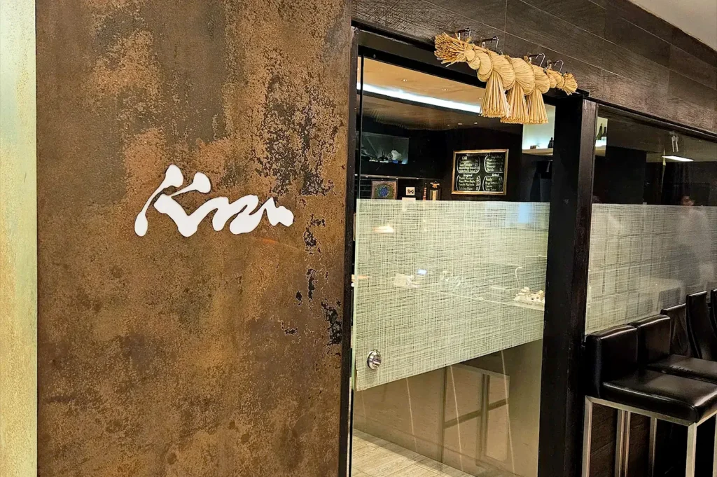 Kazu Sumiyaki Restaurant exterior entrance with Japanese-style decor and restaurant seating in Singapore