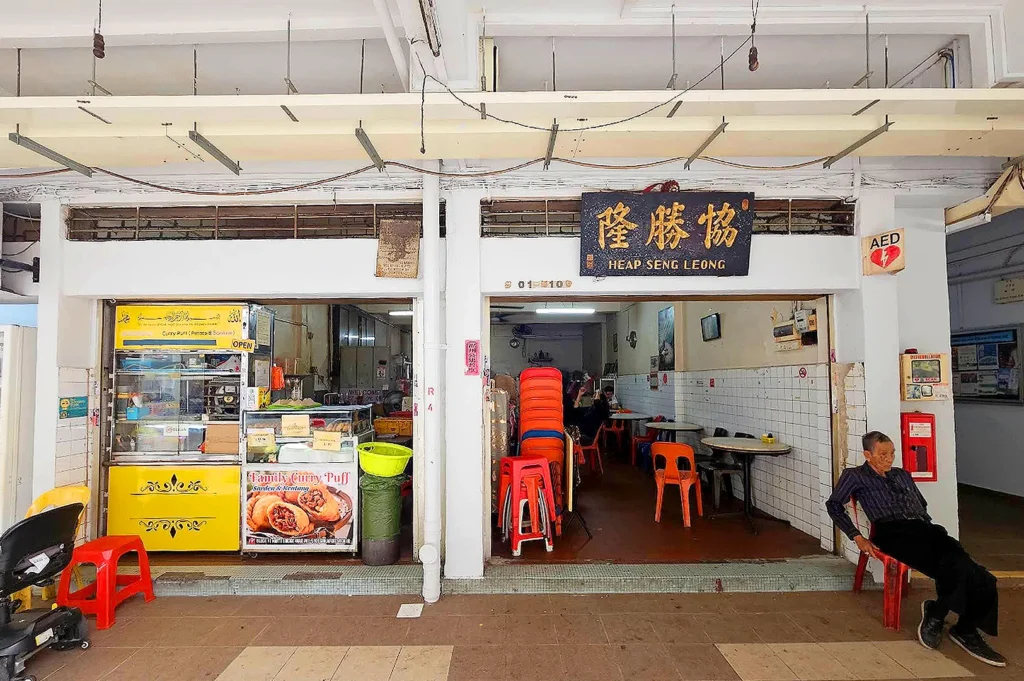 Traditional kopitiam storefront serving local coffee, kaya toast, and breakfast dishes in Singapore