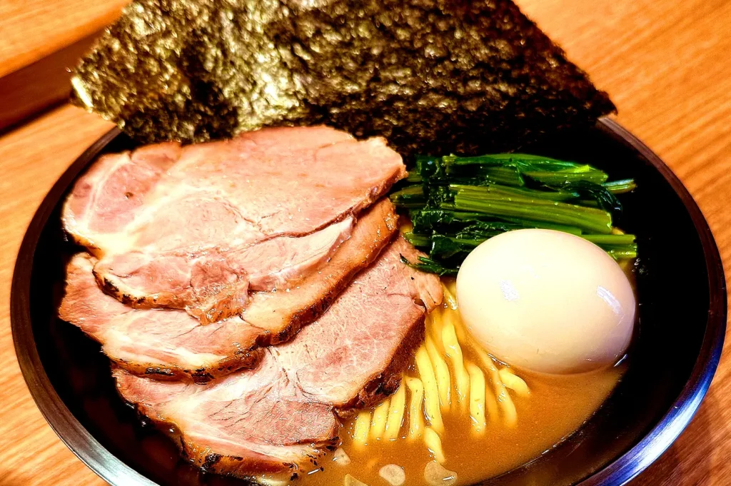 Ramen Soshiji Singapore restaurant exterior with Japanese signage, noren curtains and warm interior lighting