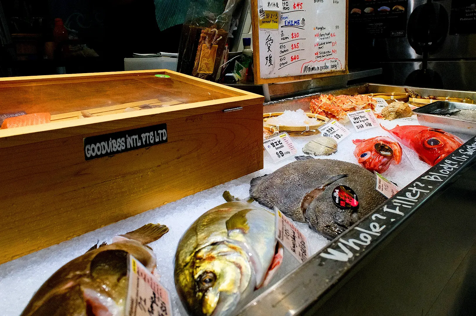 Fresh Japanese fish and seafood selection at Araya Shouten Singapore displayed on ice with price tags