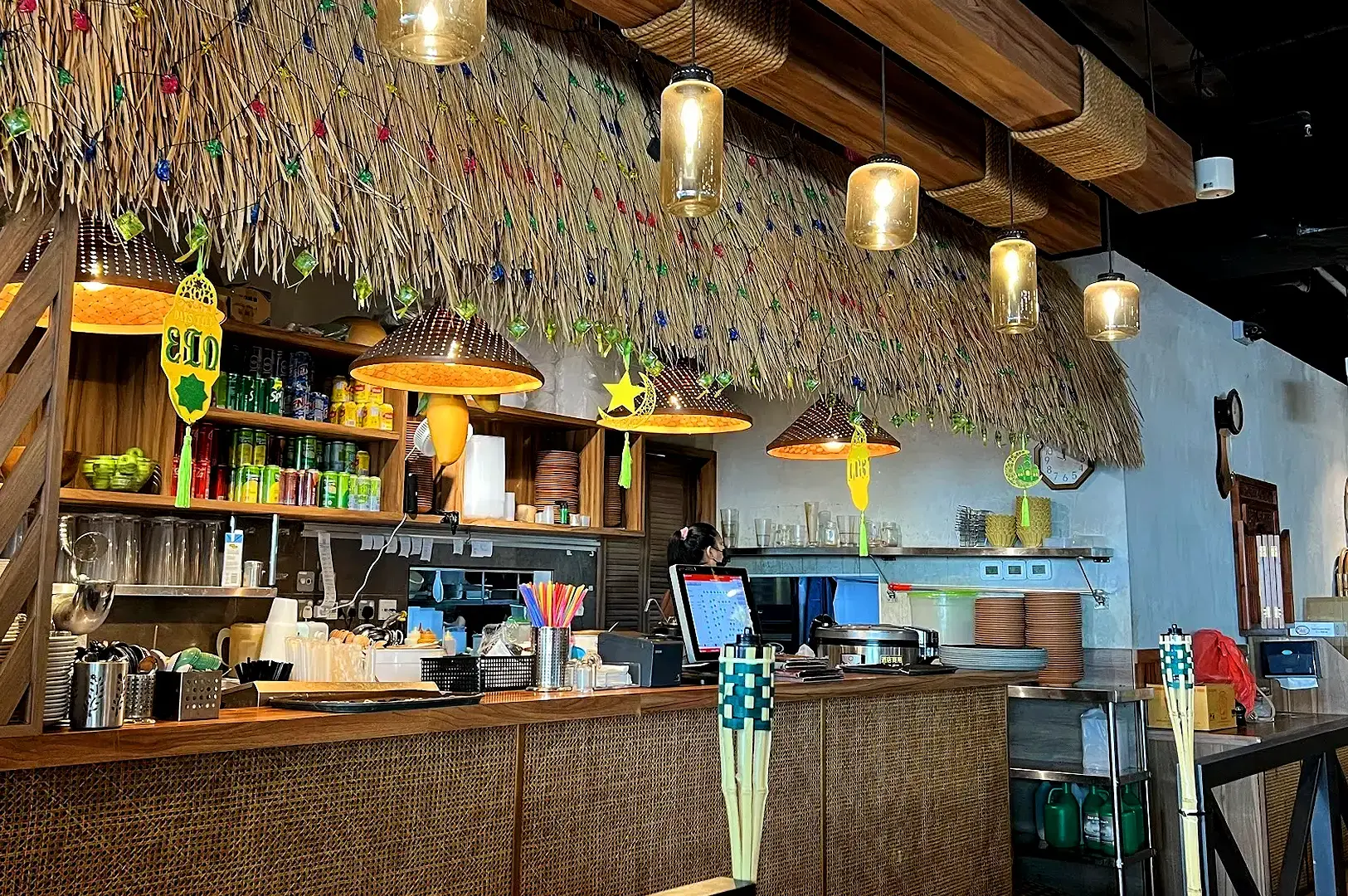 Yassin Kampung Seafood Admiralty Singapore dining interior with tropical kampung décor and warm lighting