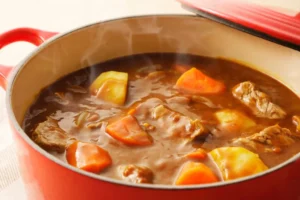 Traditional Japanese curry stew simmered with tender beef, potatoes, and carrots in rich golden curry roux.