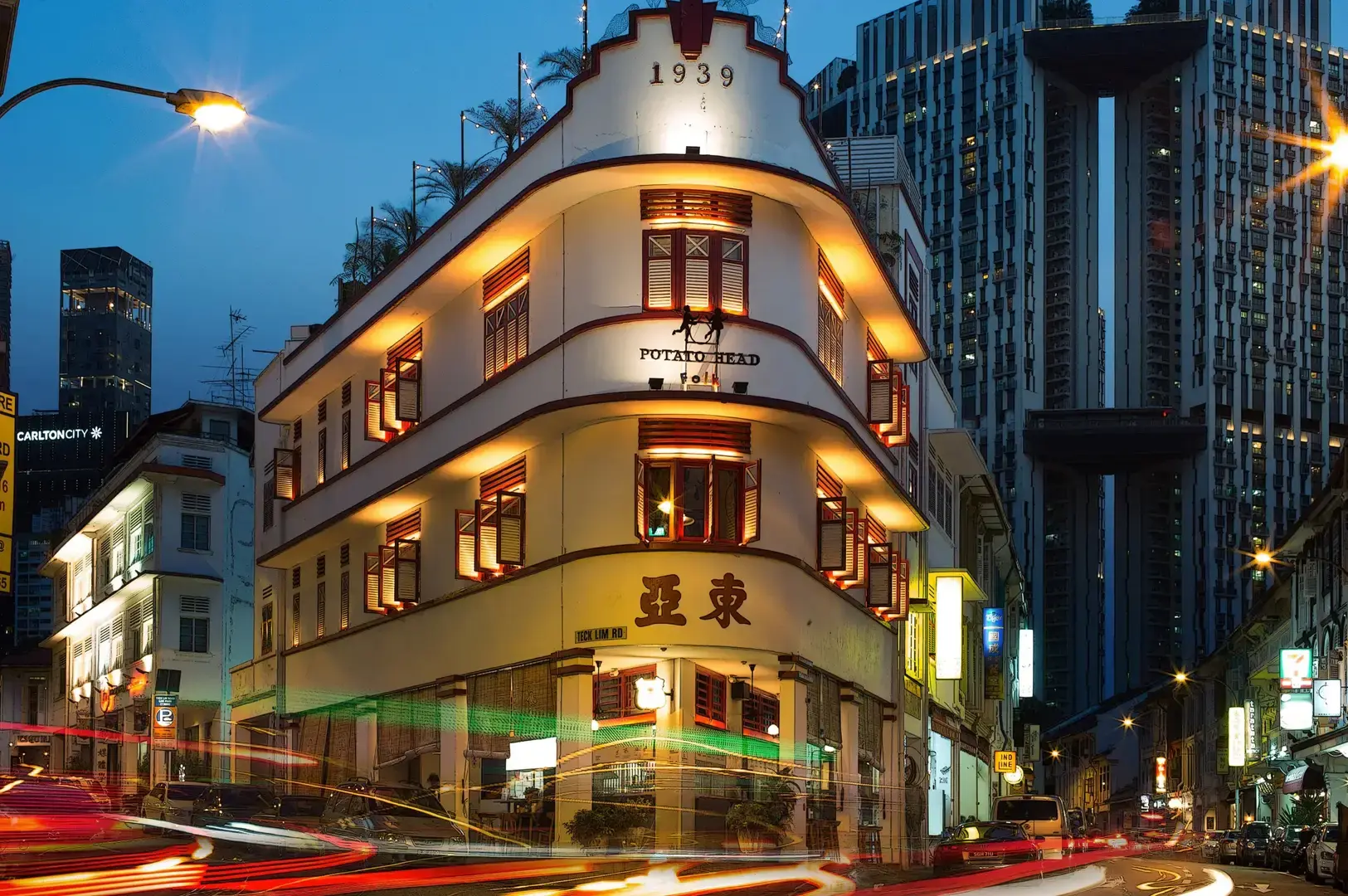 Tong Ah Eating House historic Chinatown Singapore building at night with illuminated heritage architecture and Potato Head sign