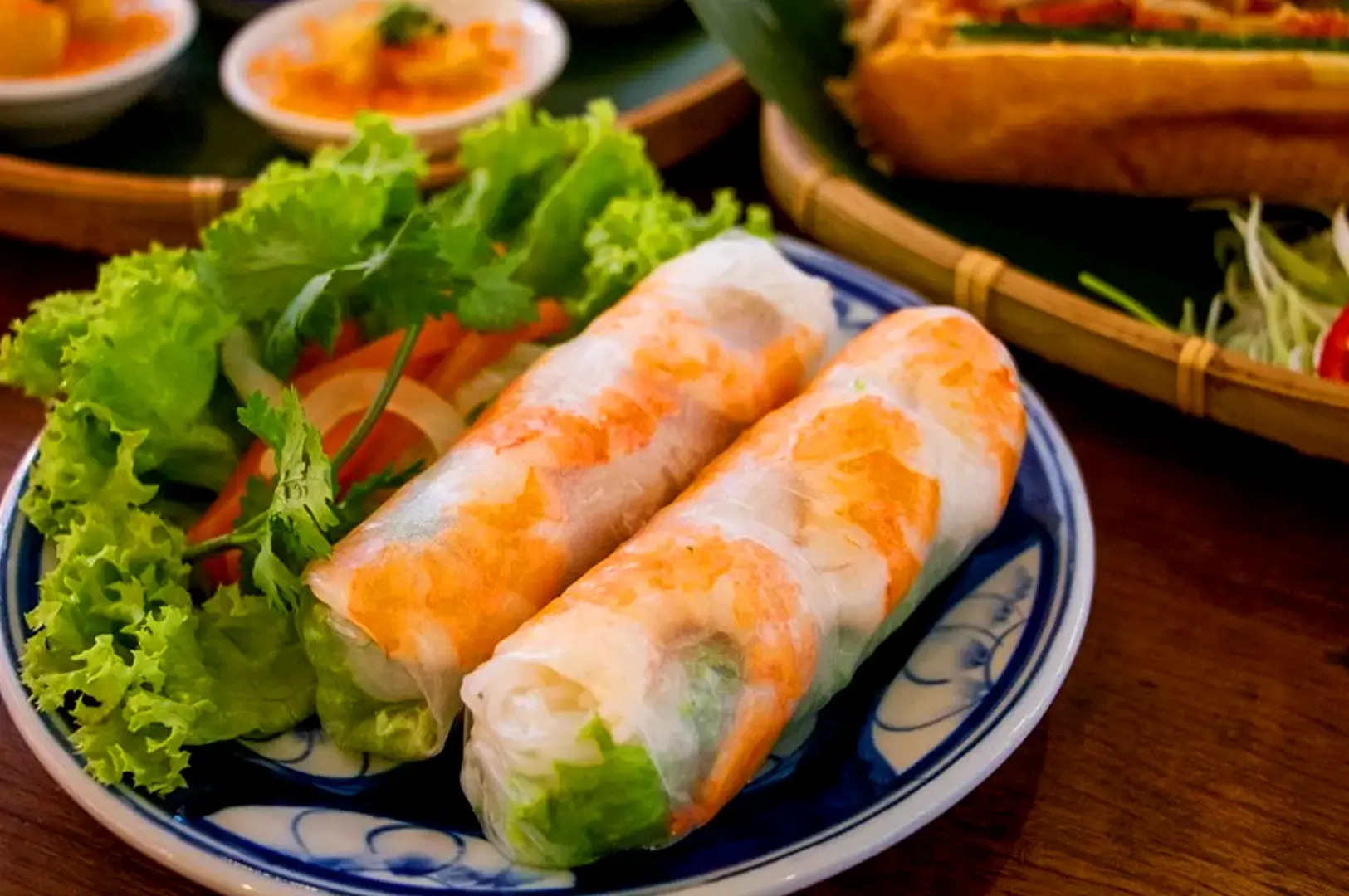 Fresh Vietnamese gỏi cuốn spring rolls with shrimp, lettuce, herbs and rice paper at Co Chung