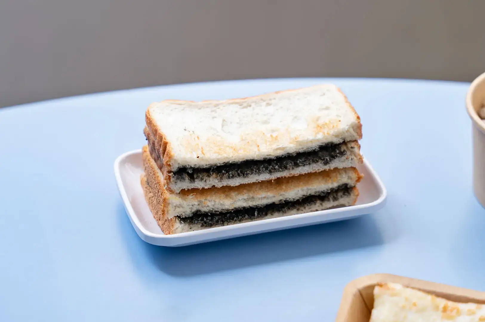 Traditional black sesame toast breakfast served at Singapore Chinatown