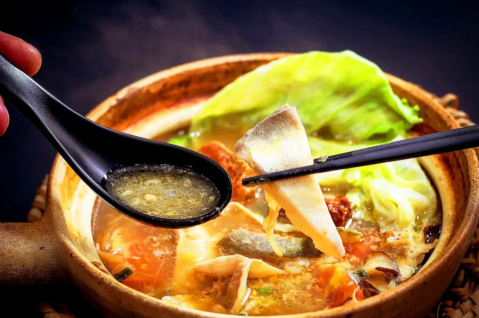 Hup Lok Singapore Teochew fish soup with fresh fish, vegetables and flavorful broth served in a claypot
