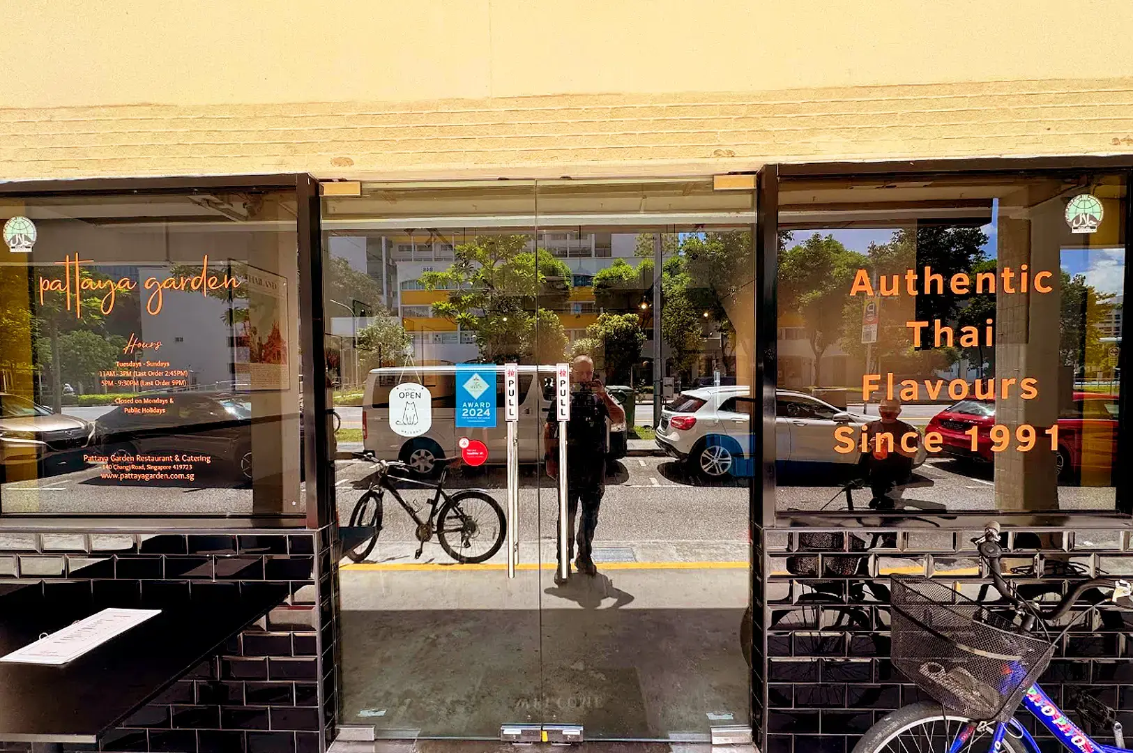 Pattaya Garden Restaurant exterior with glass entrance and signage promoting authentic Thai flavours since 1991