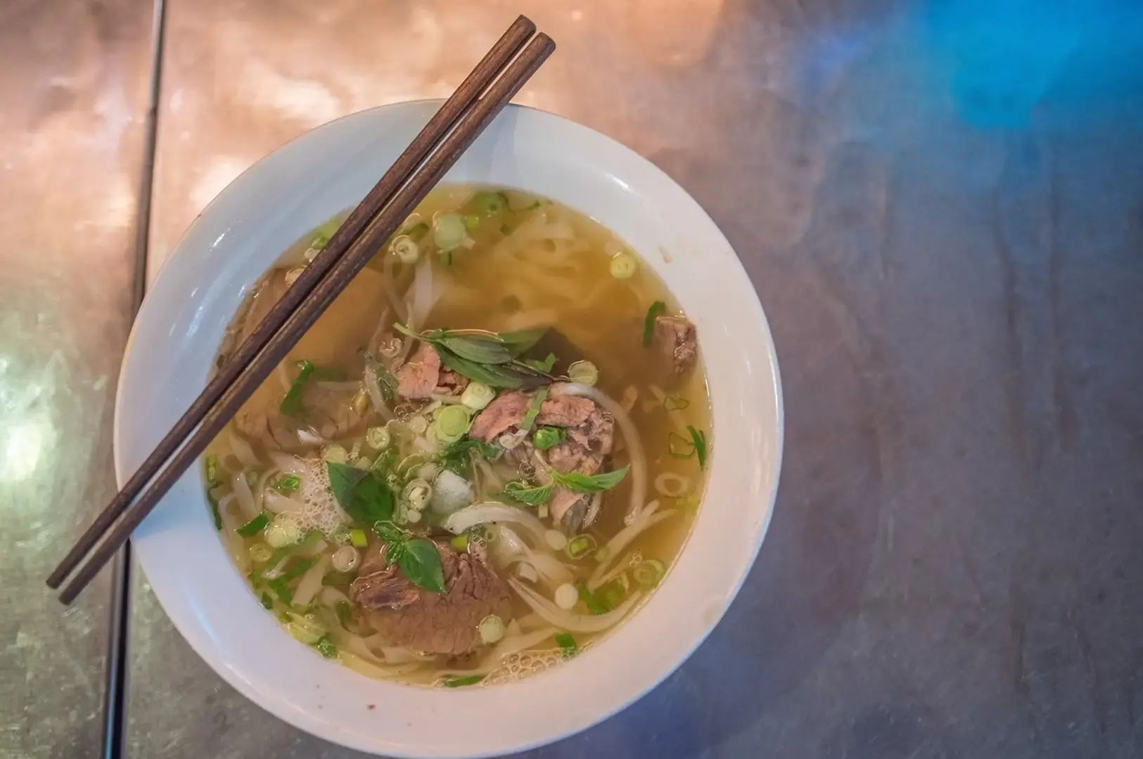 Mrs Pho Somerset Singapore beef pho with rice noodles, sliced beef, fresh herbs and spring onions