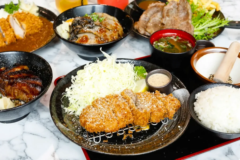 Gochi-So Shokudo Japanese restaurant lunch set with crispy tonkatsu, grilled meat, rice, miso soup and side dishes