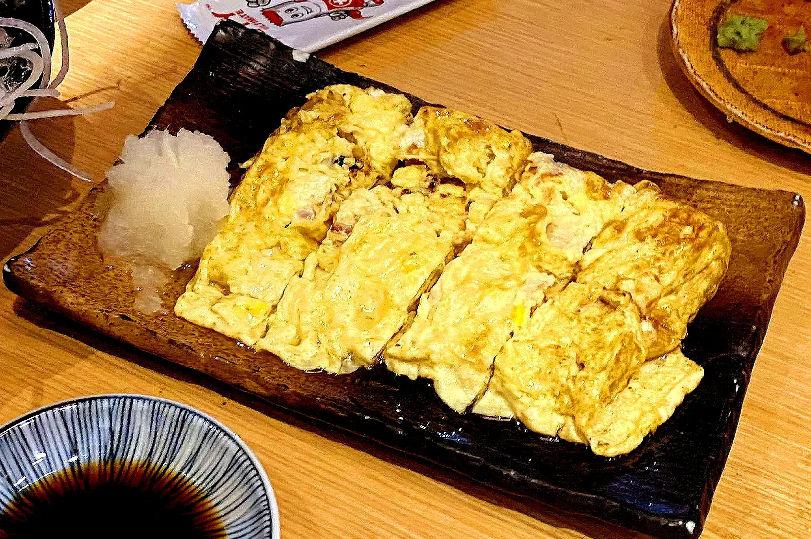 Sandaime Bunji Singapore tamagoyaki Japanese omelette served with grated daikon and soy sauce