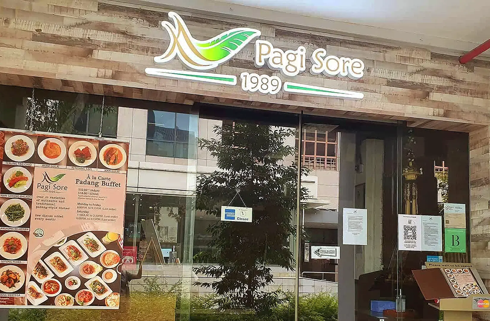 Pagi Sore Indonesian Restaurant Est 1989 Singapore exterior and entrance with restaurant sign and Indonesian food menu