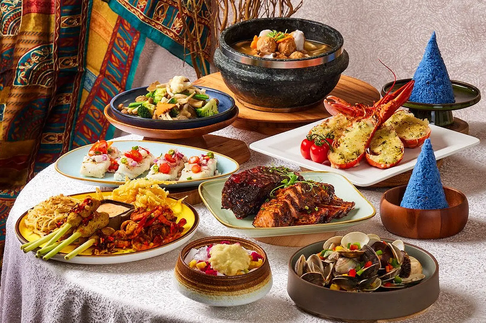 Kintamani Singapore all-you-can-eat Indonesian buffet featuring seafood, grilled meats, noodles, vegetables, and colorful rice dishes
