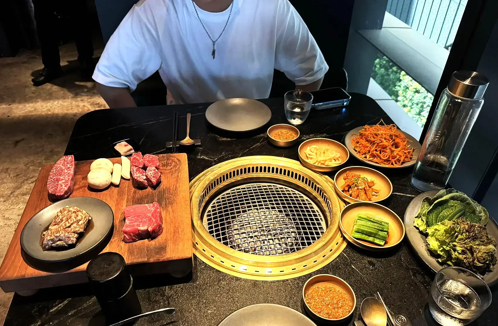 Halal Korean BBQ spread in Singapore with premium grilled beef, banchan, lettuce and dipping sauces