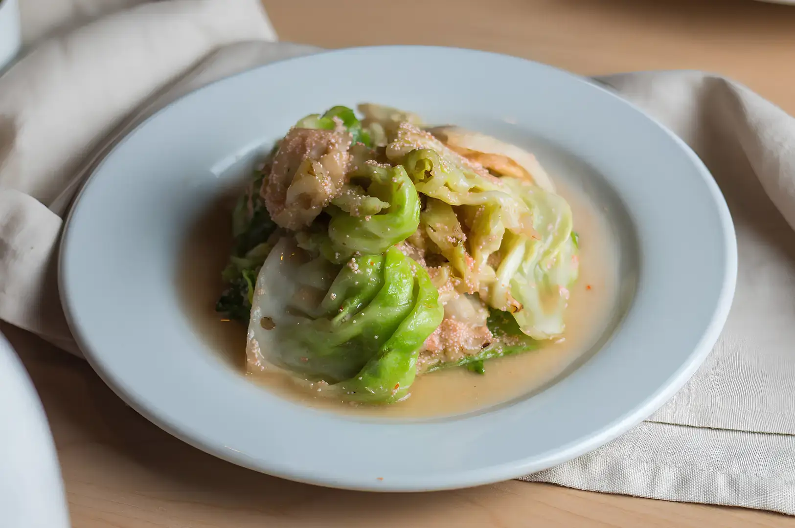 Japanese restaurant dish of cabbage and meat in light broth at Shinjuku Restaurant Singapore