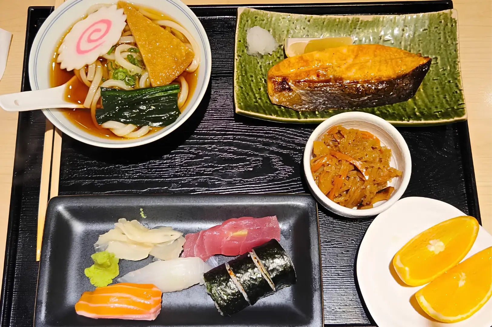 Shinjuku Restaurant Singapore Japanese meal with udon, grilled salmon, sushi and side dishes